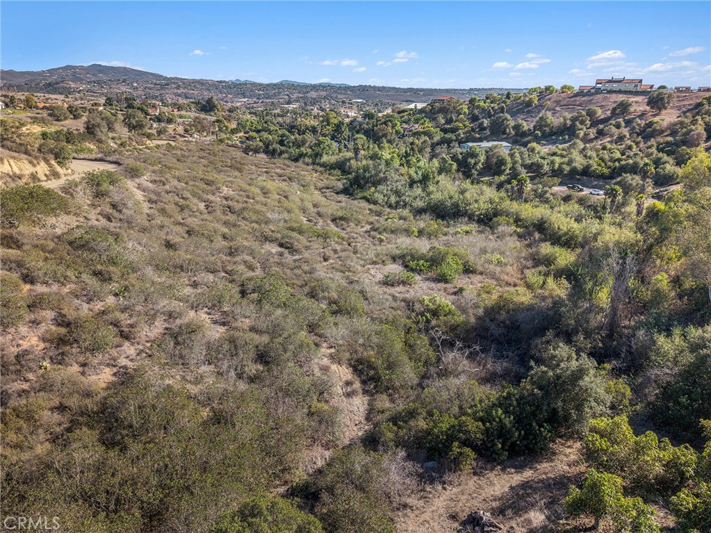0 Vía Puerta Del Sol Bonsall, CA 92003 - Photo 21 of 25 a view of a city with mountains in the background