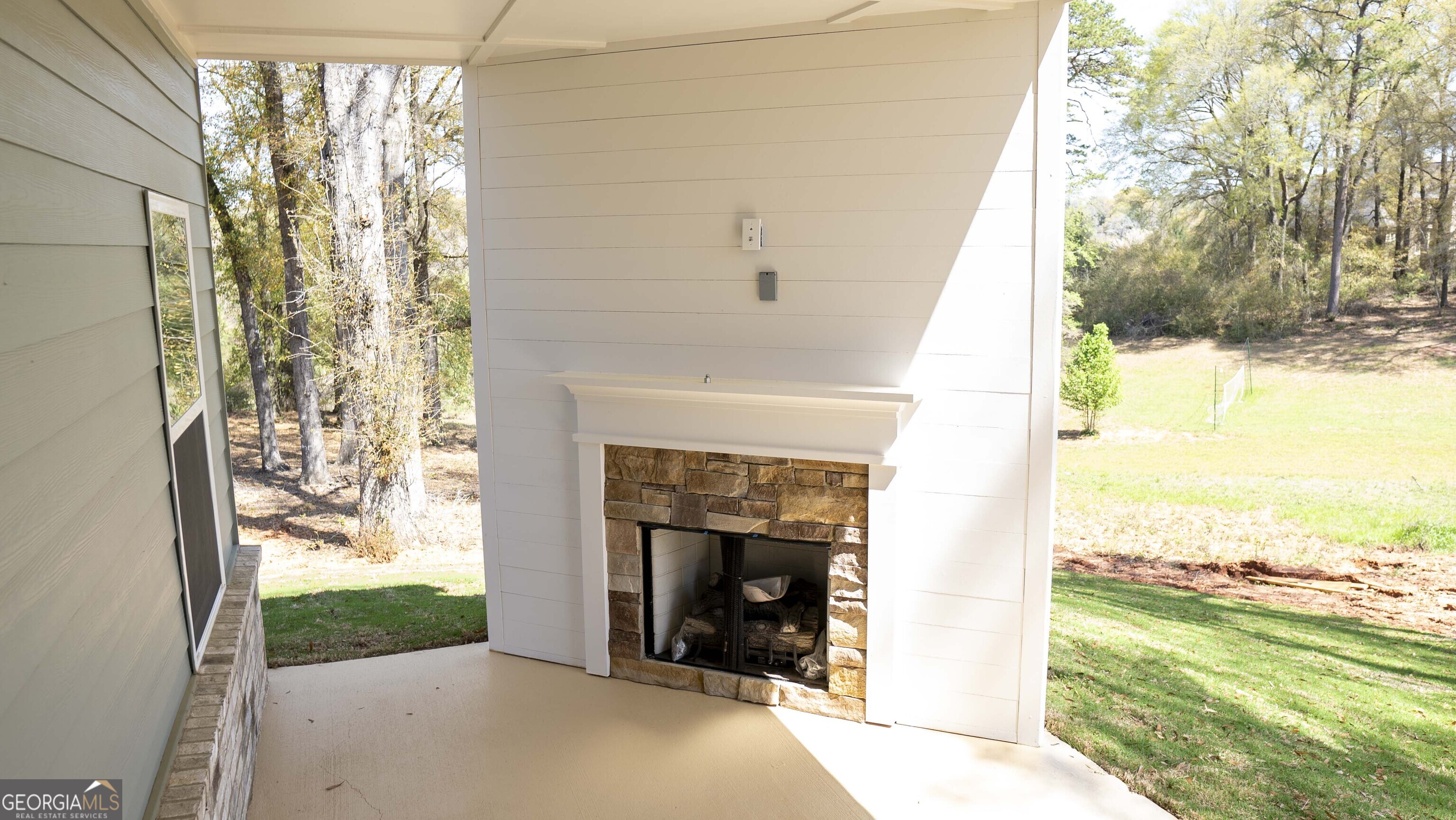 604 Beaver Court Perry, GA 31069 - Photo 37 of 40 a view of a porch and a yard