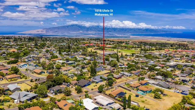 a view of a yard with an outdoor space