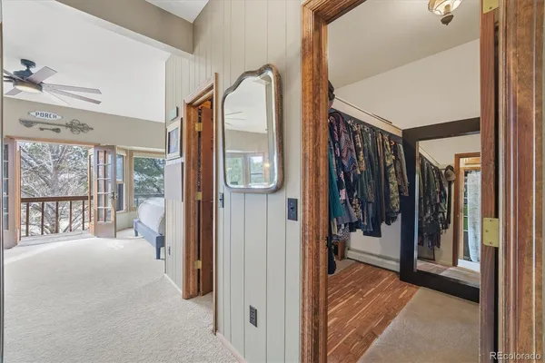 a spacious bathroom with a double vanity sink a mirror and a bathtub