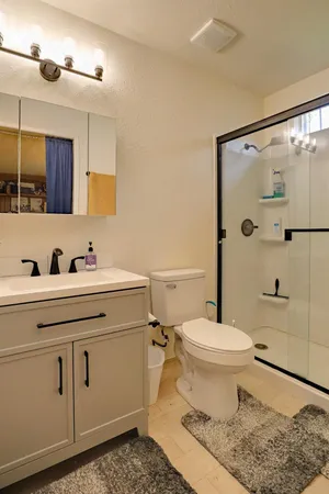 a kitchen with a table and chairs