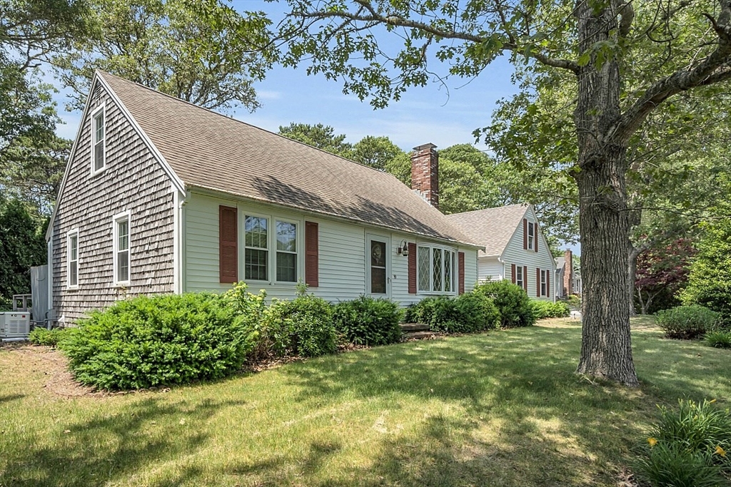 89 Kingswear Circle Dennis, MA 02660 - Photo 2 of 40 a view of a house with garden
