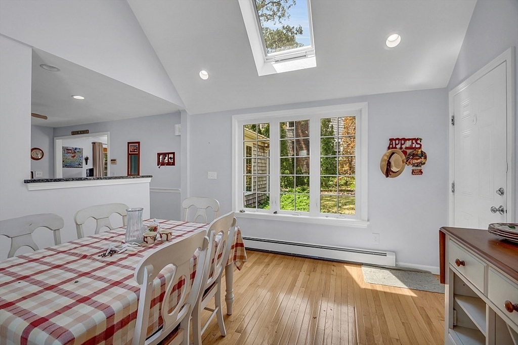 89 Kingswear Circle Dennis, MA 02660 - Photo 27 of 40 a spacious bedroom with a bed and a window