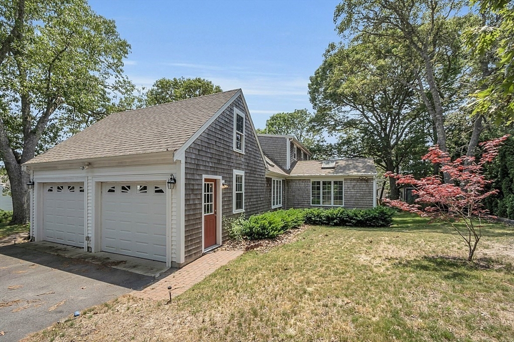 89 Kingswear Circle Dennis, MA 02660 - Photo 9 of 40 a view of backyard of house