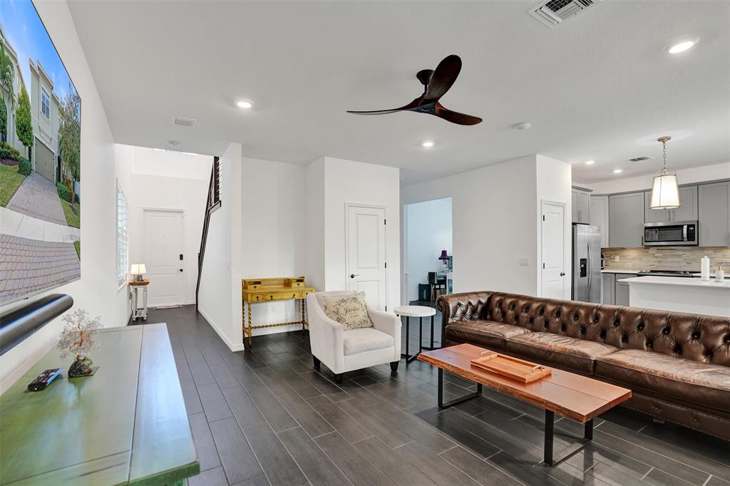 1612 Trailhead Terrace Hollywood, FL 33021 - Photo 15 of 71 a living room with furniture and a large window