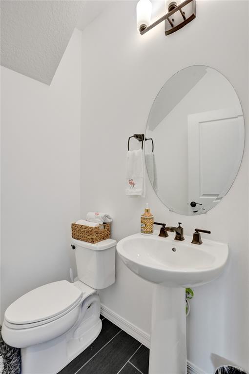 1612 Trailhead Terrace Hollywood, FL 33021 - Photo 24 of 71 a bathroom with a sink toilet and a mirror