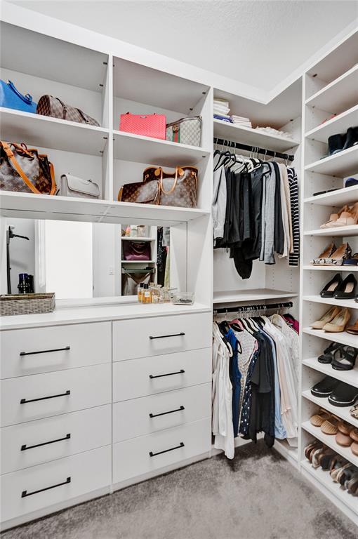 1612 Trailhead Terrace Hollywood, FL 33021 - Photo 31 of 71 a view of walk in closet with clothes and shoes