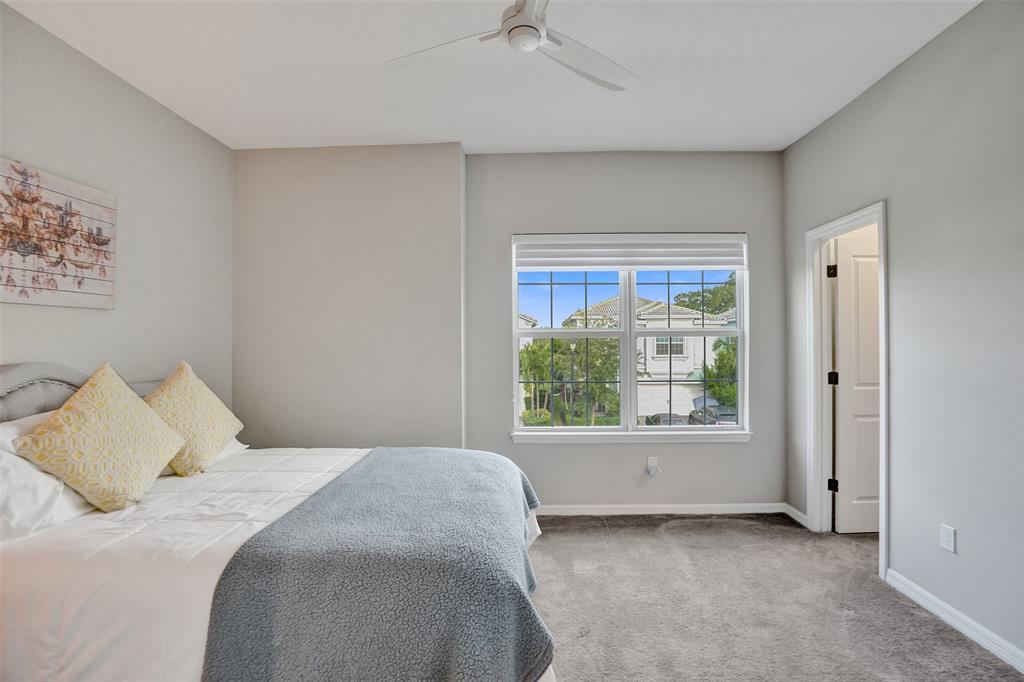 1612 Trailhead Terrace Hollywood, FL 33021 - Photo 32 of 71 a bedroom with a bed and a window