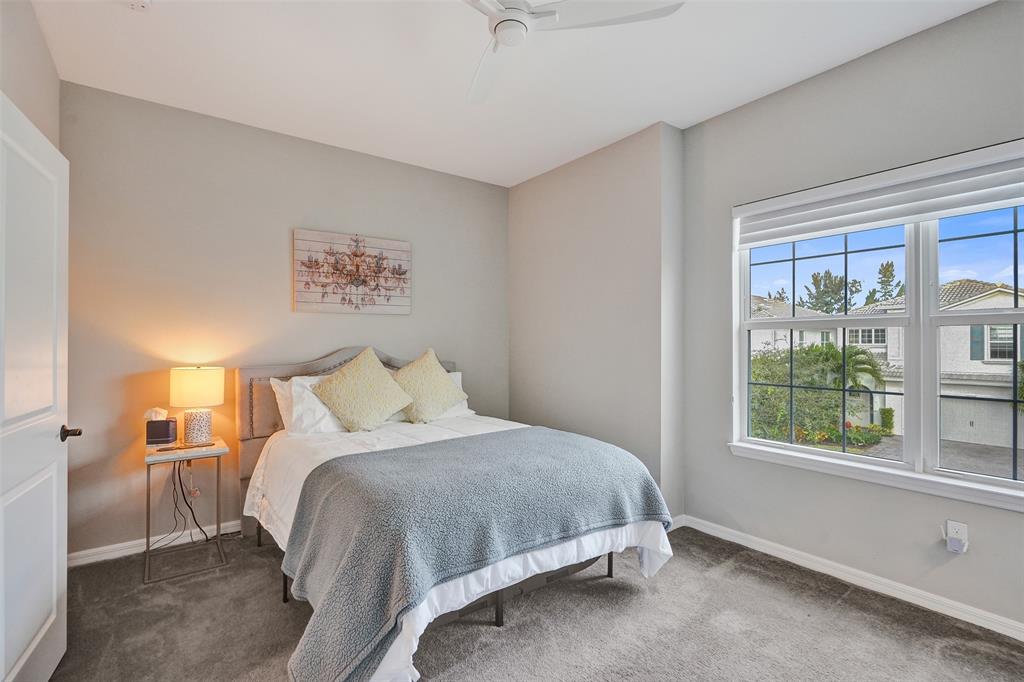 1612 Trailhead Terrace Hollywood, FL 33021 - Photo 33 of 71 a bedroom with a bed and a window