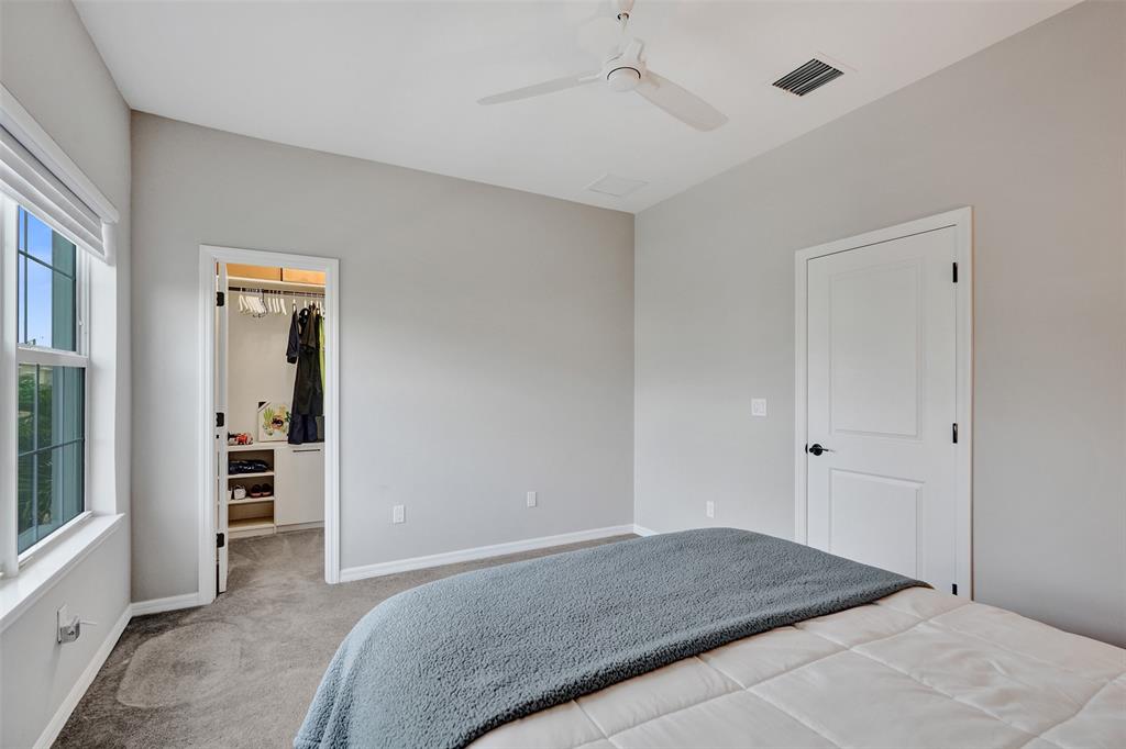 1612 Trailhead Terrace Hollywood, FL 33021 - Photo 35 of 71 a bedroom with a large bed and a window