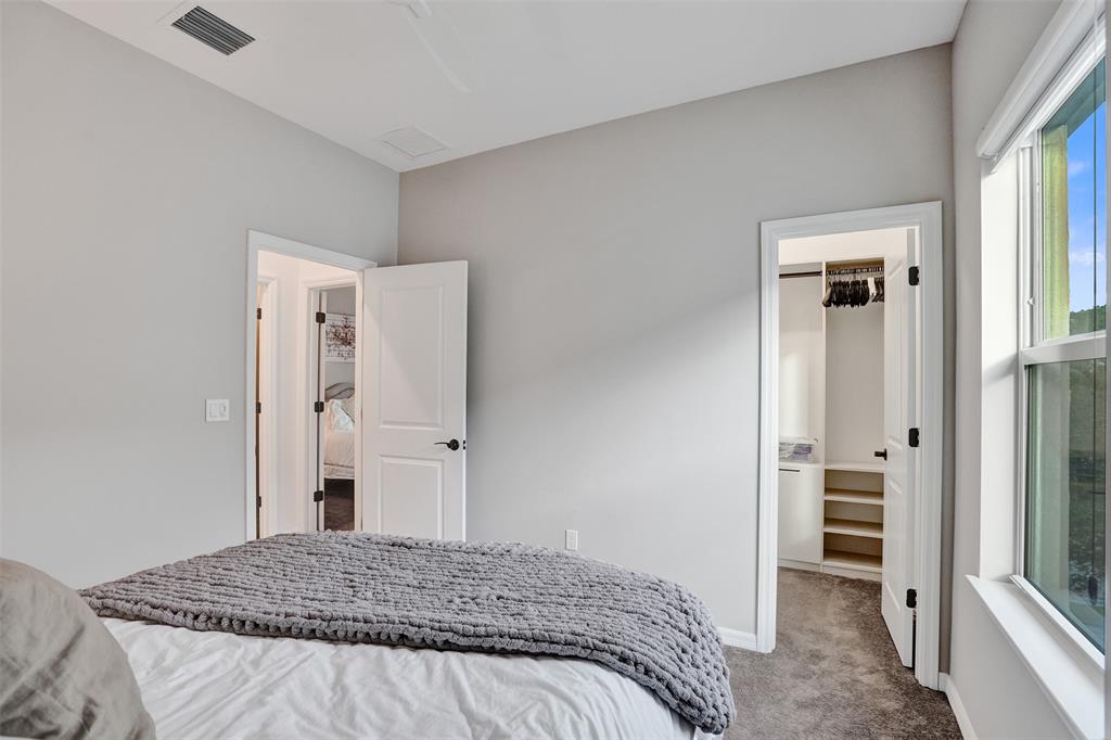 1612 Trailhead Terrace Hollywood, FL 33021 - Photo 37 of 71 a bedroom with a bed and a closet