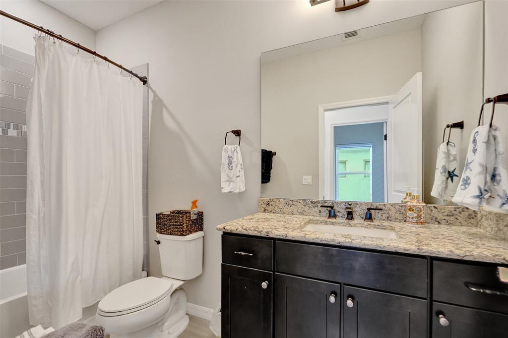 1612 Trailhead Terrace Hollywood, FL 33021 - Photo 40 of 71 a bathroom with a granite countertop sink toilet and mirror