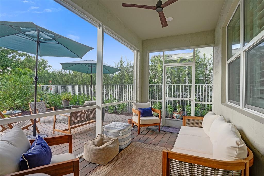 1612 Trailhead Terrace Hollywood, FL 33021 - Photo 50 of 71 a balcony with furniture and umbrella
