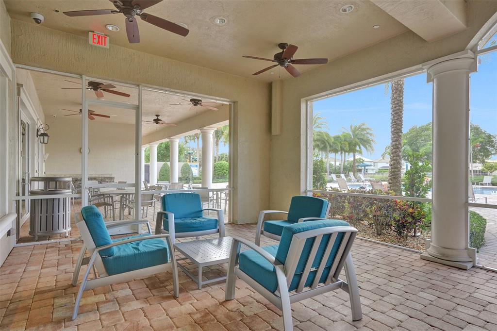 1612 Trailhead Terrace Hollywood, FL 33021 - Photo 53 of 71 a dining room with furniture a chandelier and wooden floor