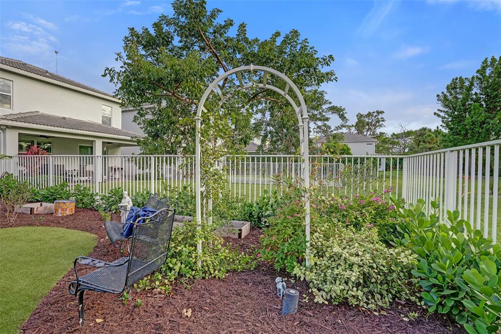 1612 Trailhead Terrace Hollywood, FL 33021 - Photo 59 of 71 a garden view with a seating space