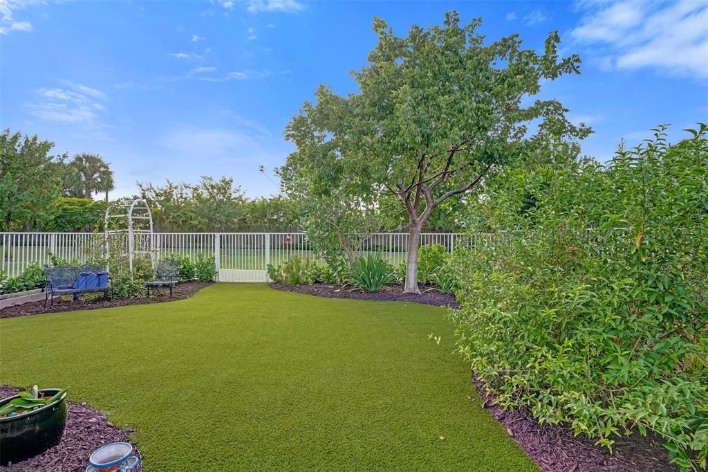 1612 Trailhead Terrace Hollywood, FL 33021 - Photo 61 of 71 a view of a backyard with sitting area