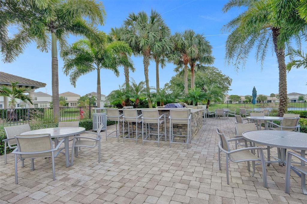 1612 Trailhead Terrace Hollywood, FL 33021 - Photo 66 of 71 a view of a tables and chairs in a patio