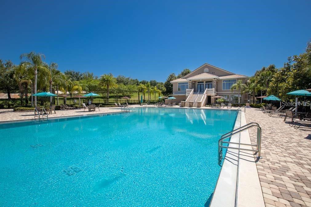 4712 Magnetite Loop Mount Mount Dora, FL 32757 - Photo 15 of 15 a view of a house with a yard