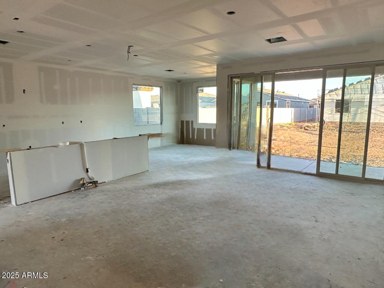 5527 West Piedmont Road Laveen, AZ 85339 - Photo 4 of 22 an empty room with large windows