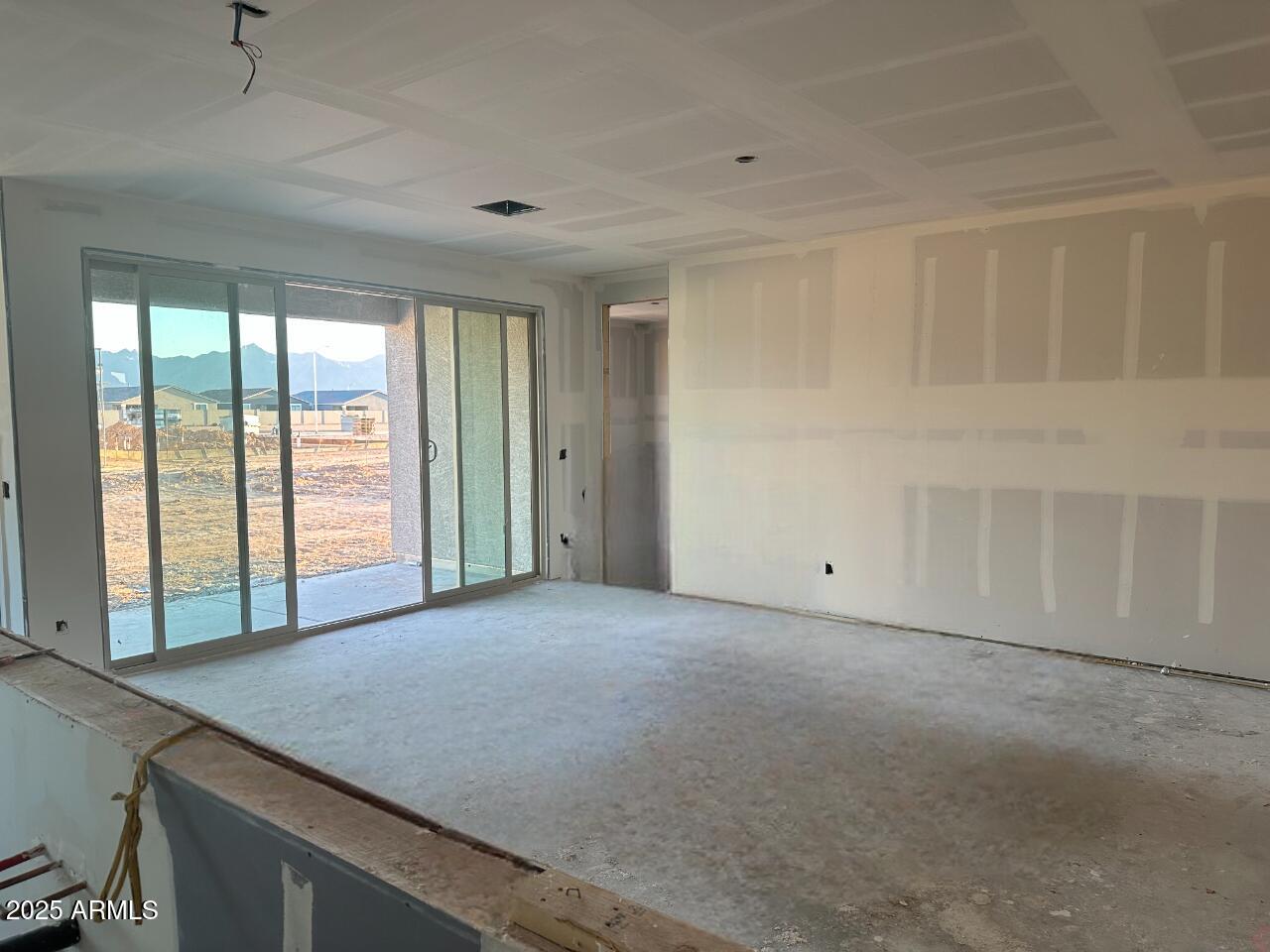 5527 West Piedmont Road Laveen, AZ 85339 - Photo 8 of 22 a view of an empty room with a window