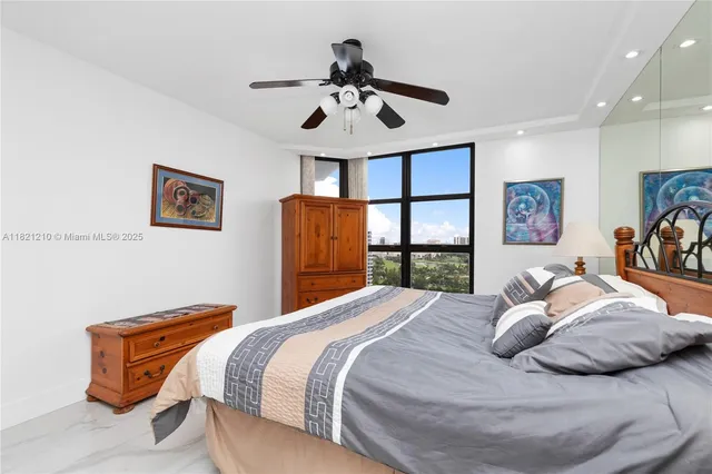 an aerial view of a house with garden space and lake view
