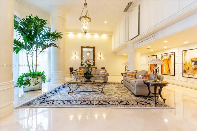 a view of living room and kitchen with furniture