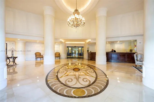 a view of a livingroom with furniture and a bookshelf