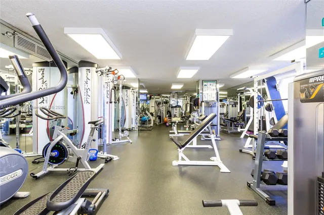 a view of a swimming pool with lounge chairs