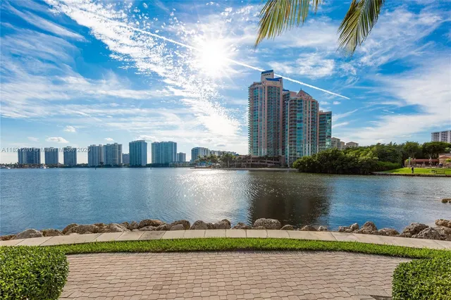 a front view of a building with outdoor space