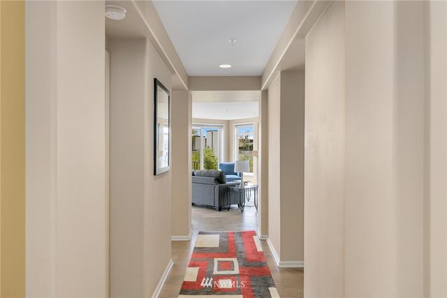 a hallway with furniture and a entryway