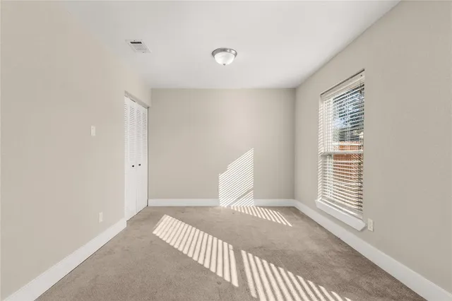 a view of a room with a window