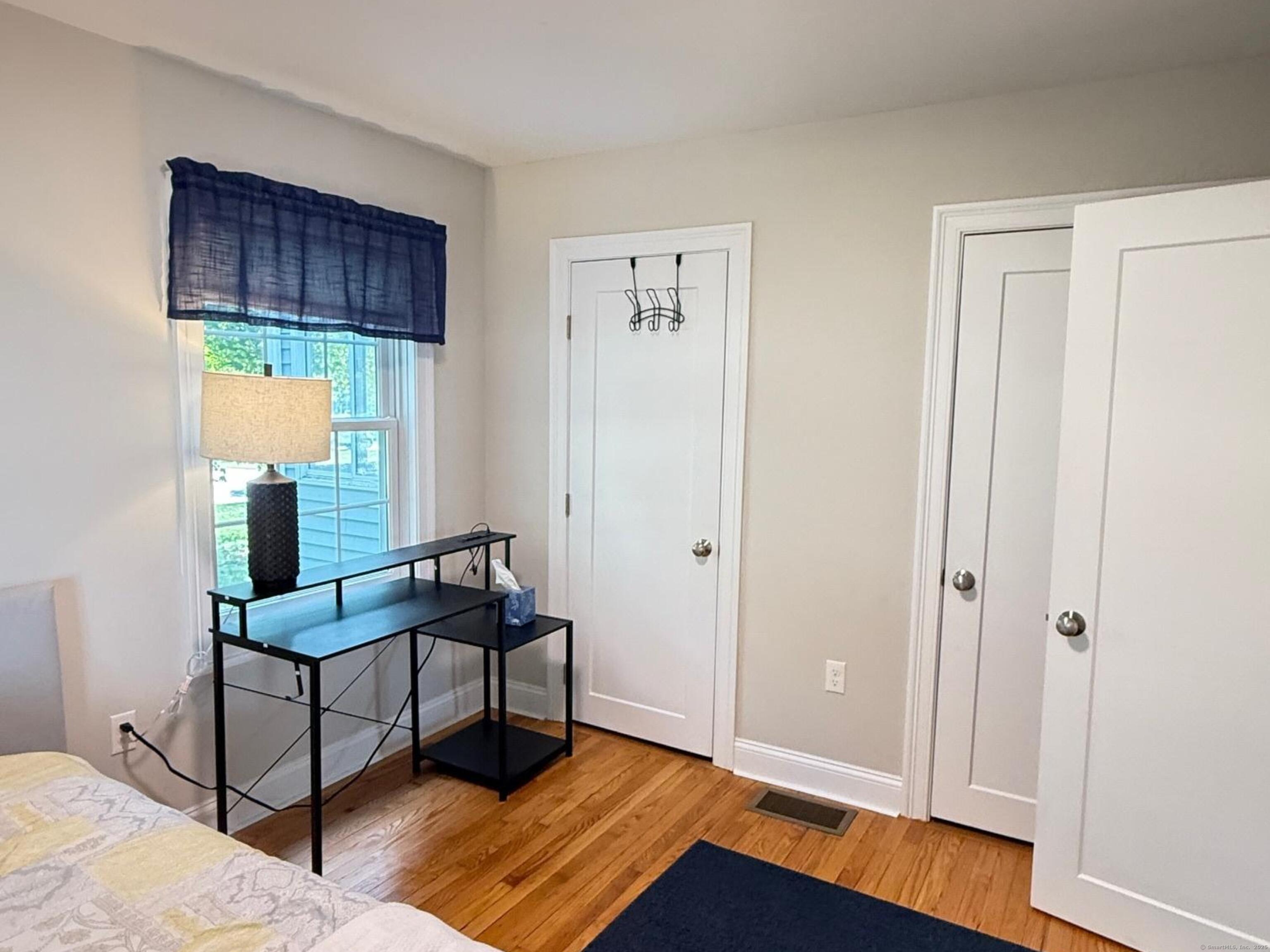 152 Hewitt Road Stonington, CT 06355 - Photo 17 of 34 a living room with furniture and a window