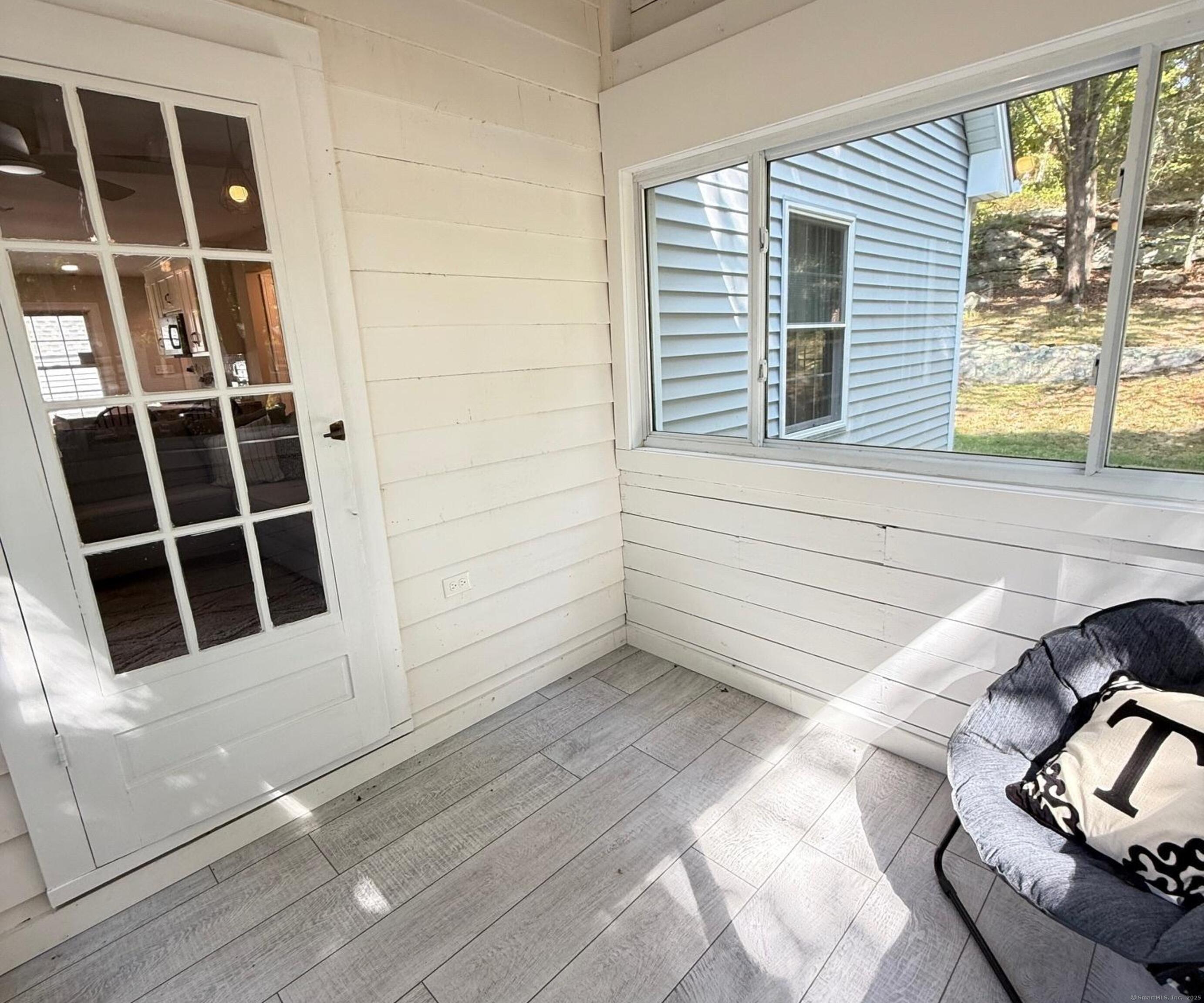 152 Hewitt Road Stonington, CT 06355 - Photo 6 of 34 a view of front door and stairs