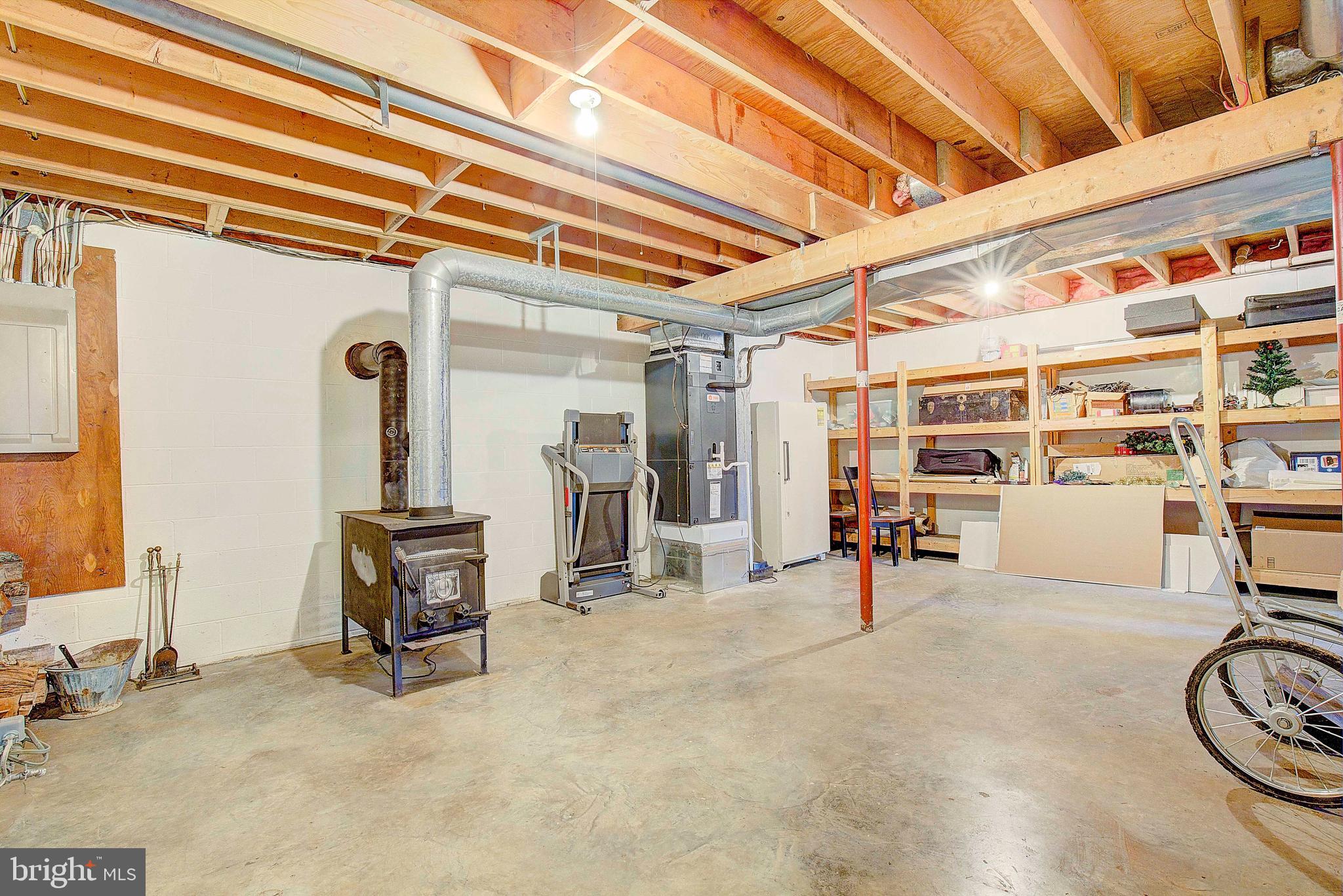 9150 Mackall Road St. Leonard, MD 20685 - Photo 30 of 48 a view of a room with gym equipment