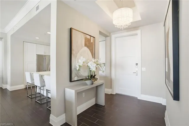 a view of kitchen with furniture and wooden floor