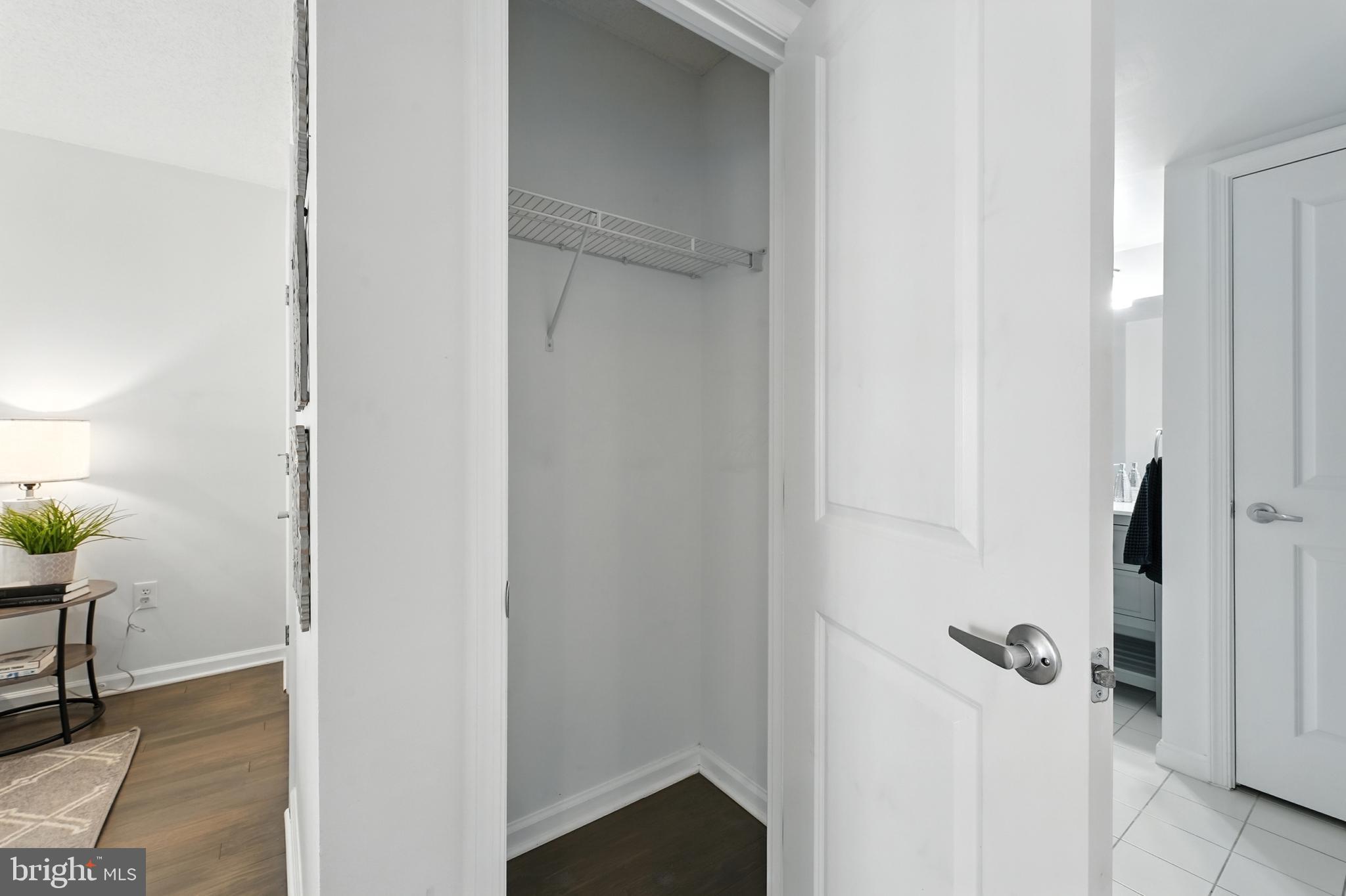 7923 Eastern Avenue Northwest, Unit 303 Silver Spring, MD 20910 - Photo 27 of 38 a view of a livingroom from a corridor