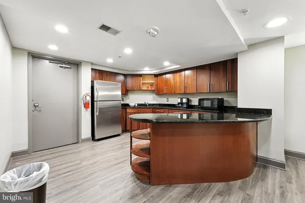 a view of a building with potted plants