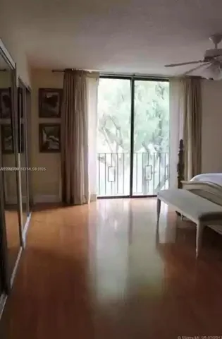 a view of livingroom with furniture wooden floor and window