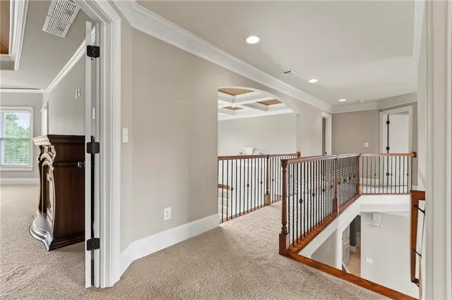 an empty room with a projector and screen