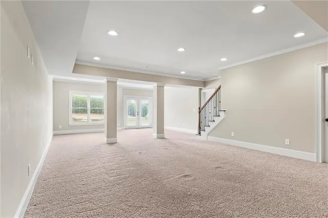a view of balcony with deck and yard