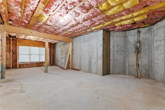 a aerial view of a house with a yard and plants