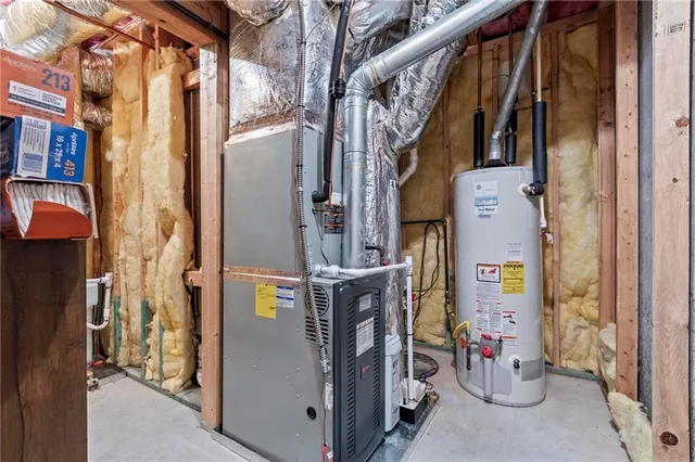 an aerial view of a houses with a swimming pool