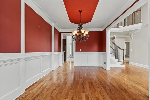 a view of entryway with wooden floor