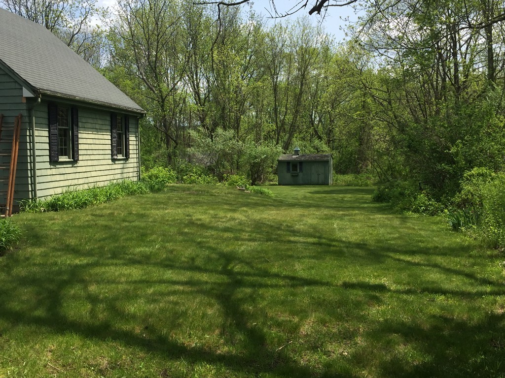 134 Pelham Island Road Wayland, MA 01778 - Photo 3 of 4 a view of a backyard