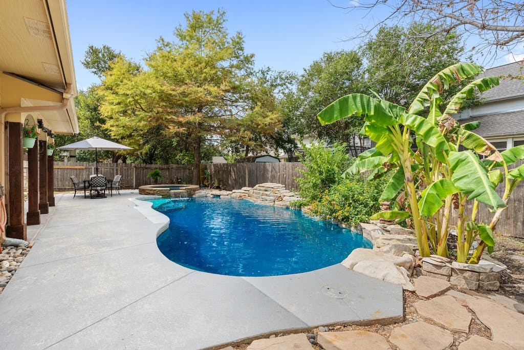 705 Del Mar Drive Georgetown, TX 78626 - Photo 1 of 1 a view of a swimming pool with a patio