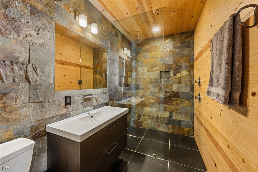 20102 Hibbet Trail Reno, NV 89511 - Photo 13 of 34 a bathroom with a sink toilet and shower