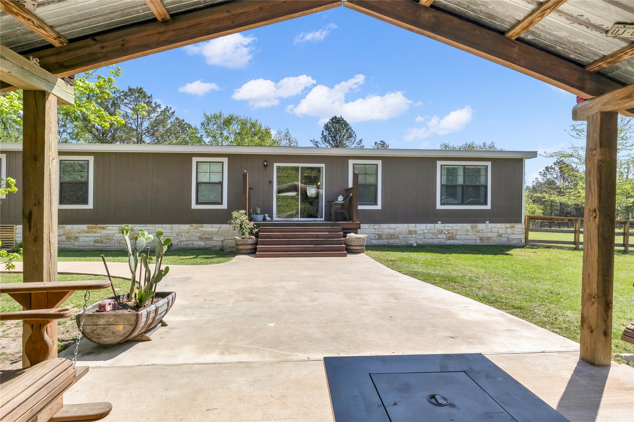 511 Denson Reed Road Cleveland, TX 77328 - Photo 34 of 42 Covered 16x20 Back Patio Behind Home
