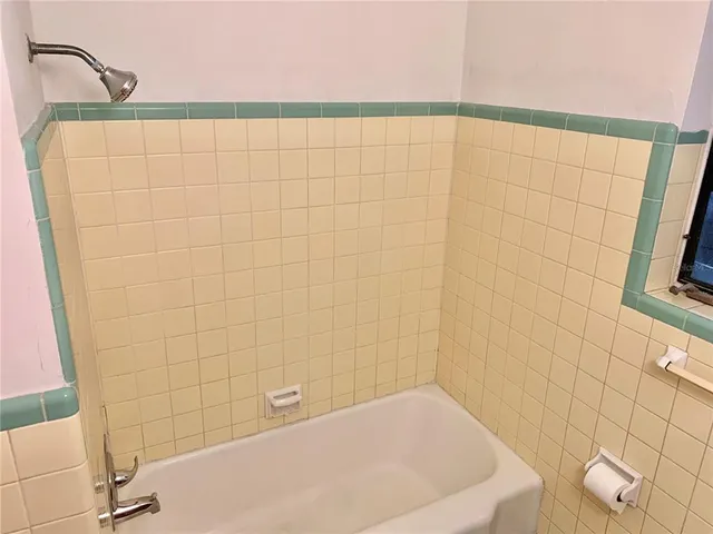 a bathroom with a bathtub