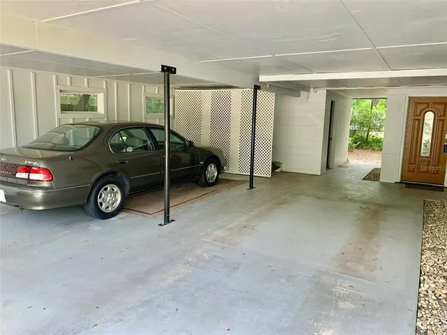 a car parked in a room next to a window