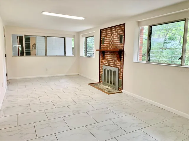 an empty room with windows